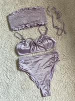 Bikini in Lila-Glanz-Optik - Größe 36/38 Niedersachsen - Brake (Unterweser) Vorschau