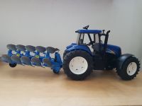 Bruder Traktor New Holland und Pflug blau Rheinland-Pfalz - Sohren Hunsrück Vorschau