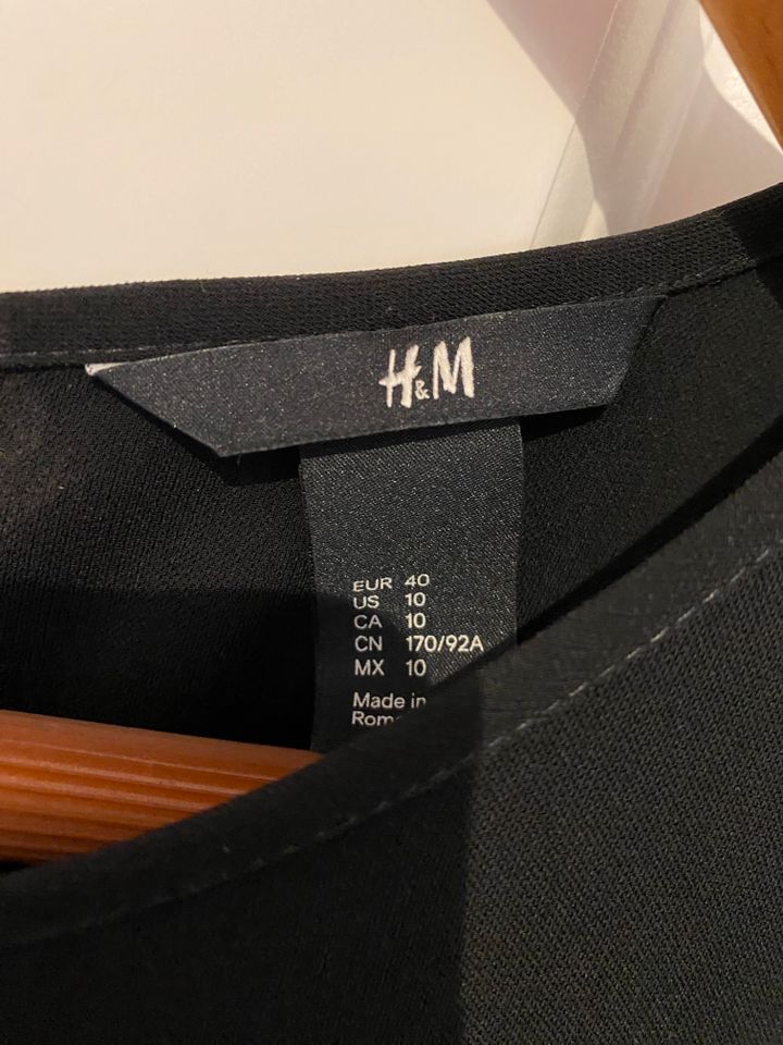 Kleid schwarz Gr. 40 Damen H&M , Schößchen, transparente Details in Meerbusch