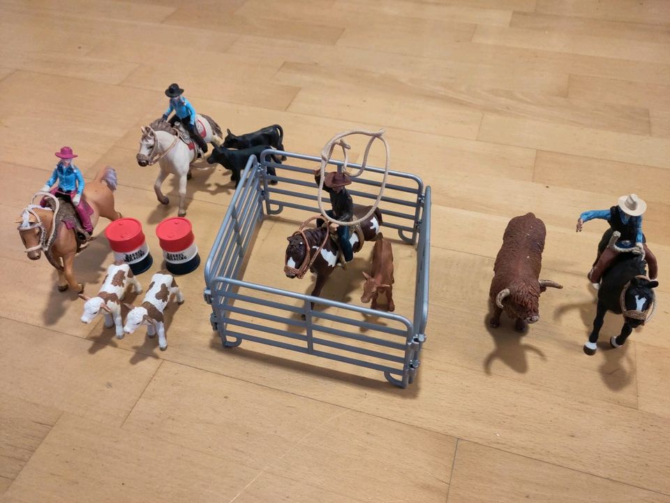 Schleich Cowboy und Cowgirl mit Pferden und Kühen in Ehningen