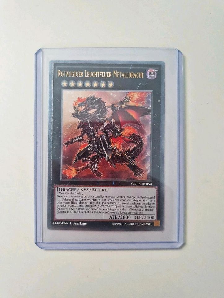 Yu-Gi-Oh! Rotäugiger Leuchtfeuer-Metalldrache CORE-DE054 Ultimate in Höchberg