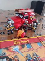 Feuerwehrauto mit Figuren und Büchern Berlin - Tempelhof Vorschau