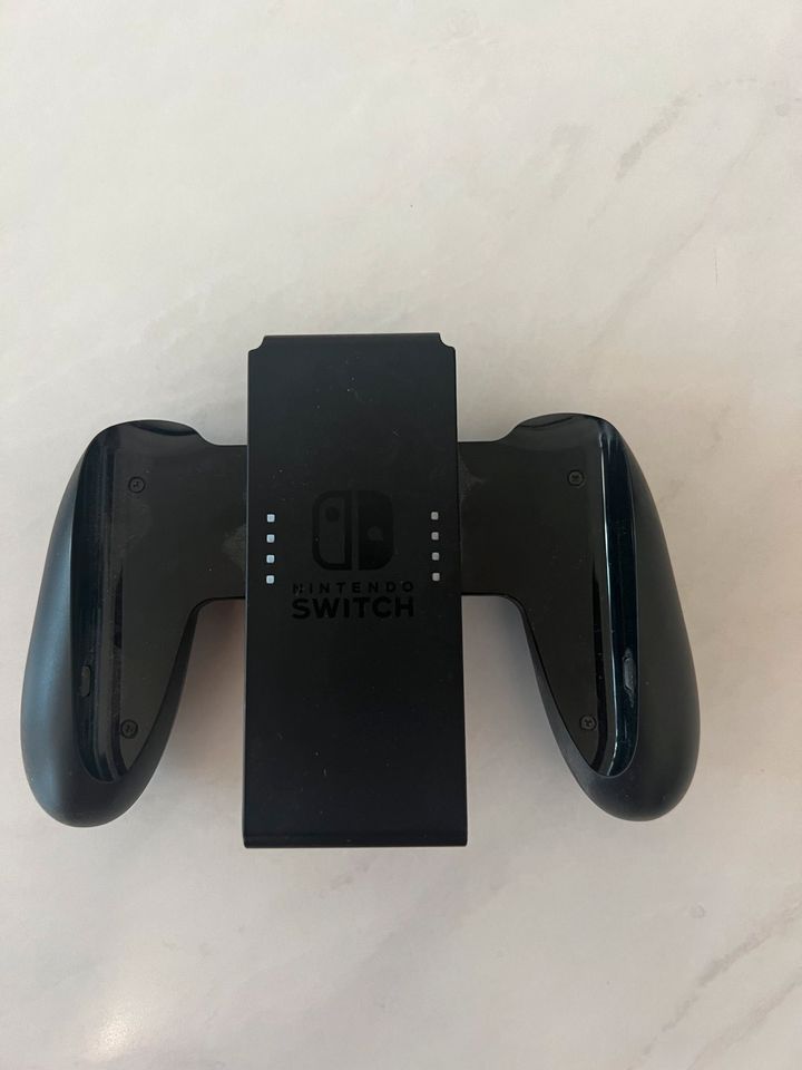 Nintendo Switch ( mit drei spielen und controller ). in Neckarsulm