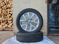 BMW X1 Alufelgen mit Bridgestone Reifen (205/60R17) - 3 Saisons g Bayern - Coburg Vorschau