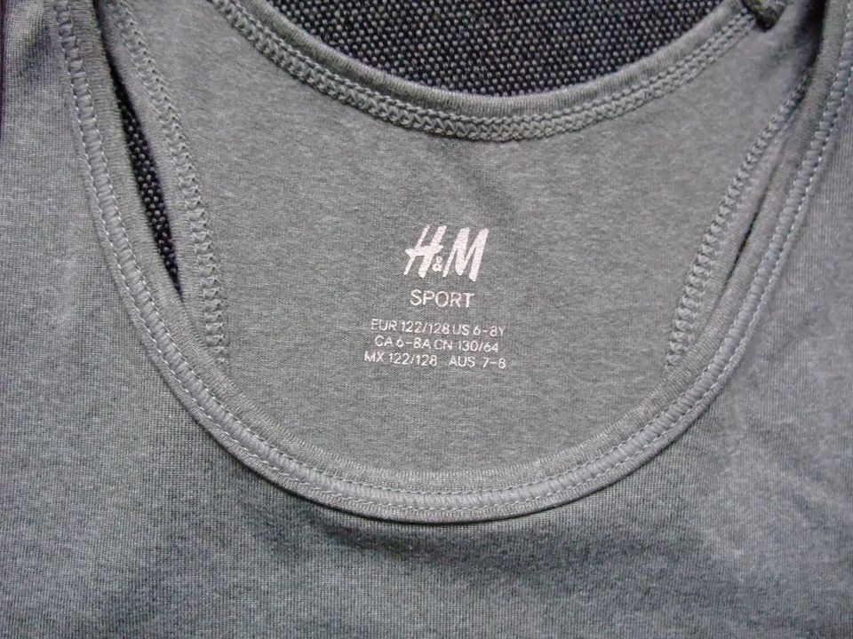 Mädchen Sport Shirt Achselshirt Top, H&M, Gr. 122-128, grau in Michelstadt