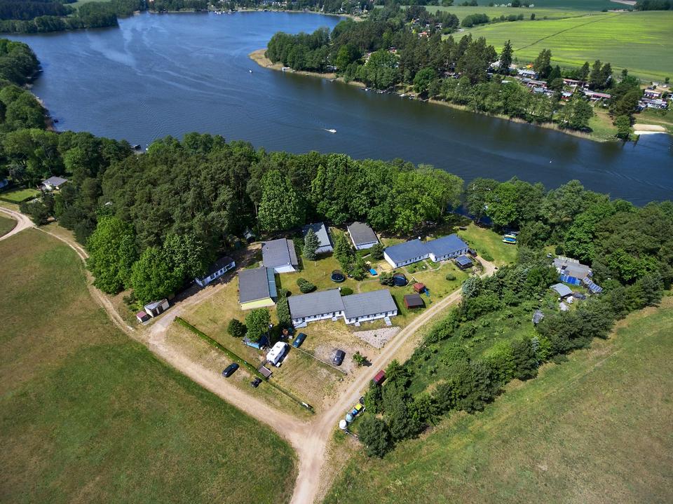 Ferienhaus am See mit Steg, Motorboot, E- Bikes, Paddelboote, SUP in Rheinsberg