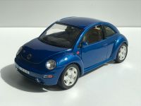 Bburago Burago VW Volkswagen New Beetle blau 1:18 Modell Schleswig-Holstein - Bargteheide Vorschau