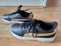 Puma Sneaker Gr. 41 / UK 7,5 schwarz weiß gold Nordrhein-Westfalen - Oelde Vorschau