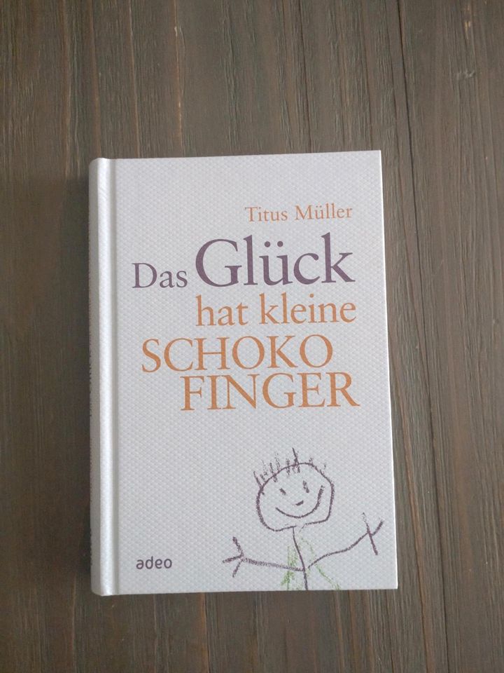 Buch Das Glück hat kleine Schokofinger vom Titus Müller in Niddatal