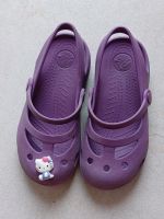 Lila Crocs Sandalen mit Hello Kitty Button, C 11, Größe 28/29 Nordrhein-Westfalen - Laer Vorschau