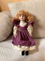 Puppe mit Kleid Porzellangesicht 40 cm Hessen - Oberursel (Taunus) Vorschau