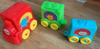 Babyspielzeug Zug - 3 bunte Wagen Nordrhein-Westfalen - Salzkotten Vorschau