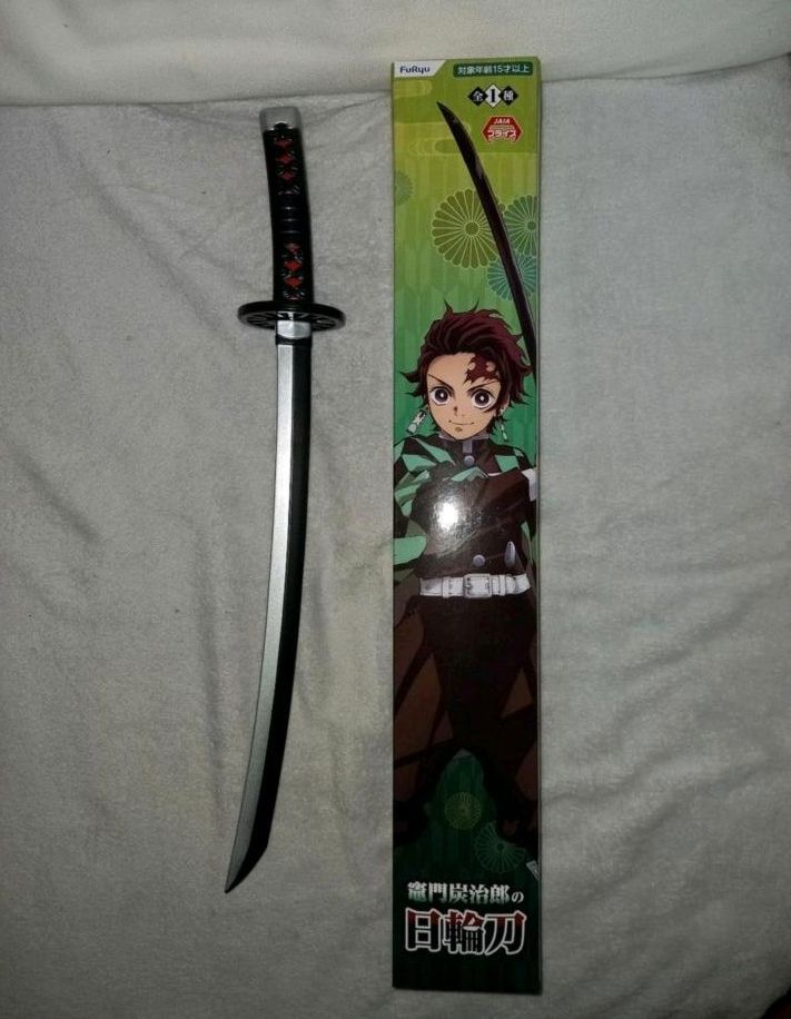 Demon Slayer Merch: Nichirin von Tanjiro Kamado + Poster in Rheda-Wiedenbrück