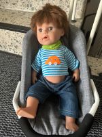 Puppe Junge mit n Maxi Cosi Innenstadt - Poll Vorschau