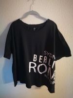 Schwarzes T-Shirt mit Beschriftung.. Größe 48/50 Versand möglich Hessen - Brechen Vorschau