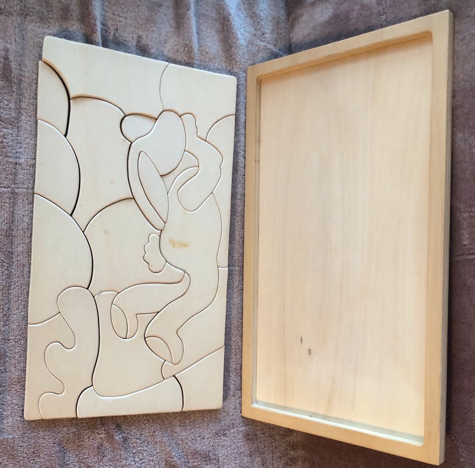 Holzpuzzle, handarbeit, so gut wie neu in Schwarzenbruck