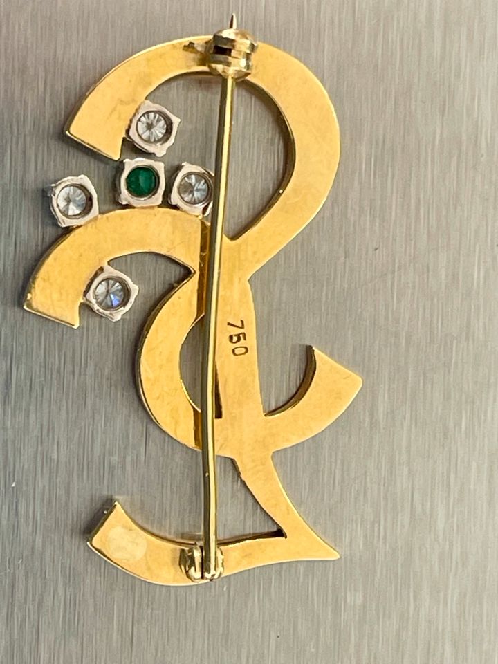 Goldbrosche 750, mit 4 Diamanten und 1 Smaragd in Stuhr