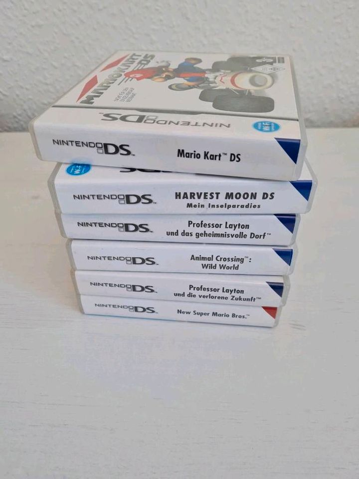 Nintendo DSlite + Spiele + Kabel +Schutzhülle in Großengottern