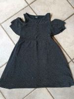 Kleid schwarz Silber Glitzer 134/140 Nordrhein-Westfalen - Schleiden Vorschau