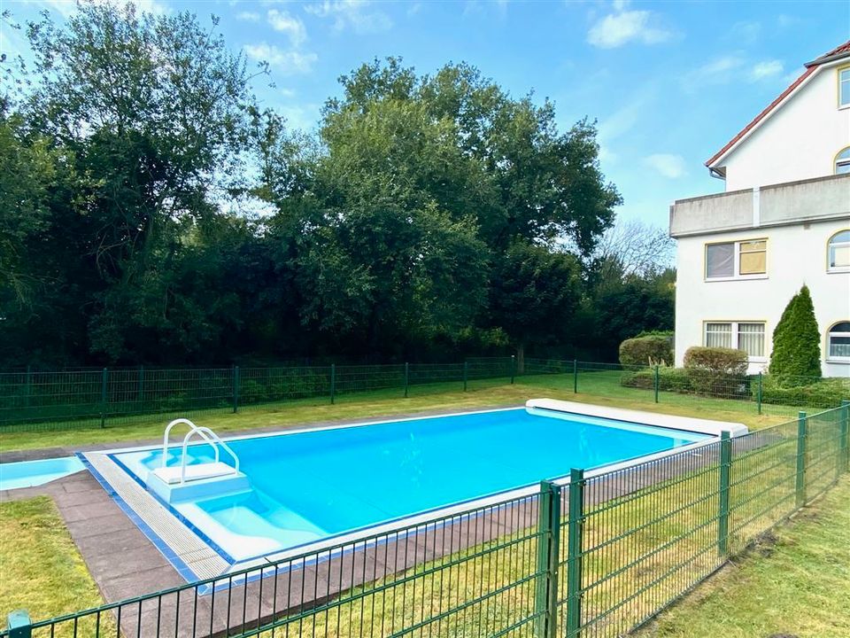 Gepflegte Erdgeschosswohnung mit einer sonnigen Terrasse, TG-Stellplatz und Gemeinschaftspool! in Kaltenkirchen