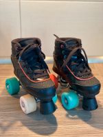 Kinder Rollschuhe Oxelo Größe 31 schwarz Roller Skates Niedersachsen - Westoverledingen Vorschau