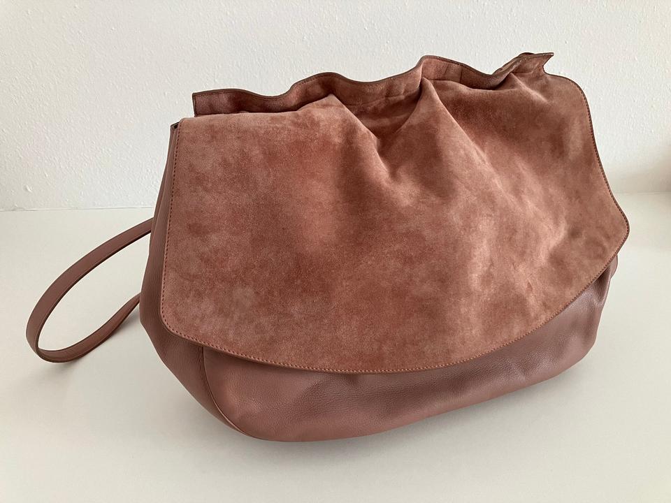 Jil sander clutch hotsell