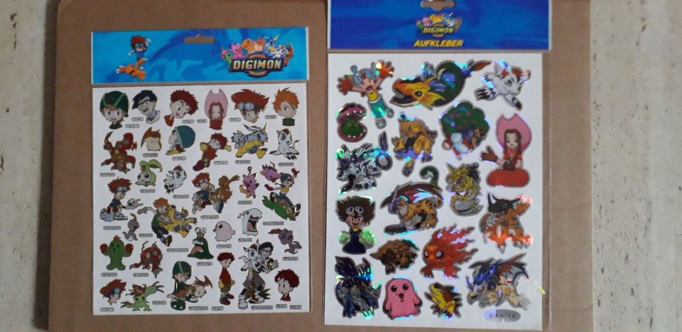 DIGIMON- Sammlung-Bilderrahmen- VHS- Sticker-Postkarten-Vintage in Bedburg-Hau