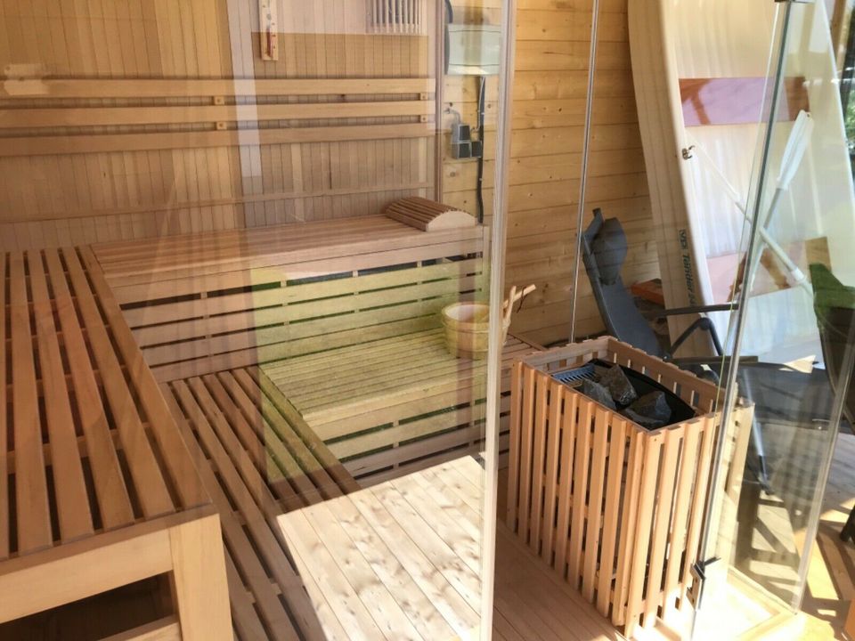 „Oskar“ Ferienhaus am See Urlaub Kurzurlaub Winterurlaub Sauna Kamin Boot Angeln Surfen in Delitzsch