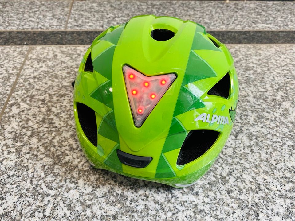 Fahrradhelm Kinder Alpina, grün mit Dino, unfallfrei in Eibelstadt
