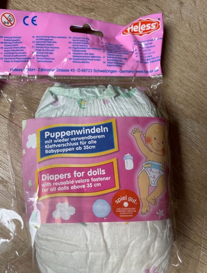 Schlafsack für Puppen, wie neu, + Windeln neu in Nördlingen