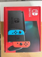 Nintendo Switch Konsole mit Joy-Con - Neon-Rot/Neon-Blau/Grau Rheinland-Pfalz - Rheinbrohl Vorschau