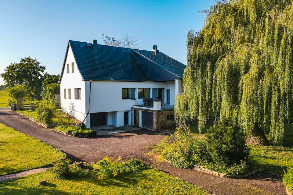 Einfamilienhaus mit viel Platz und Potenzial - mitten im Grünen ! in Gübs