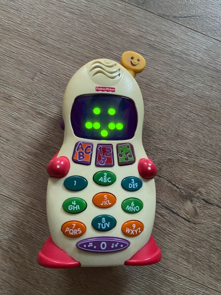 Babyspielzeug Telefon von Fisher Price in Mörfelden-Walldorf