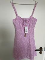 NA-KD x Pamela Reif rosa Sommerkleid mit Rüschen Blumen Nordrhein-Westfalen - Siegen Vorschau
