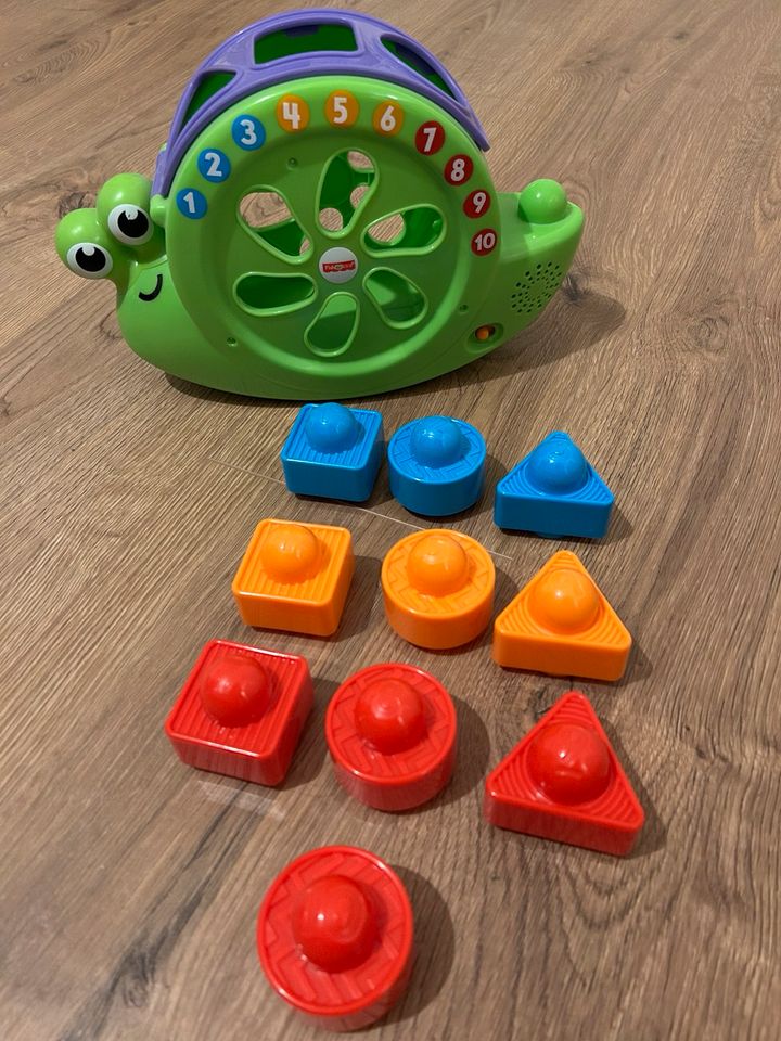 Fisher Price Motorikspielzeug Musik Zahlen Schnecke Stapelspiel in Lappersdorf