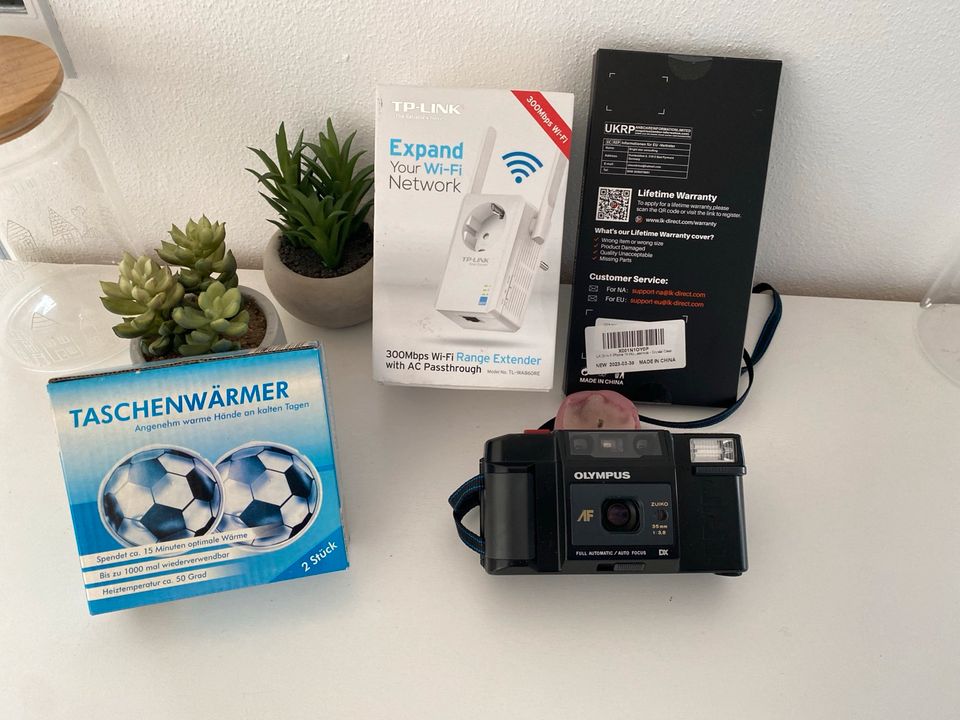 Kamera Olympus 35mm-1:3,8 24€/ Taschenwärmer 4€/ Hüllf. IPHONE 1 in Großmehring
