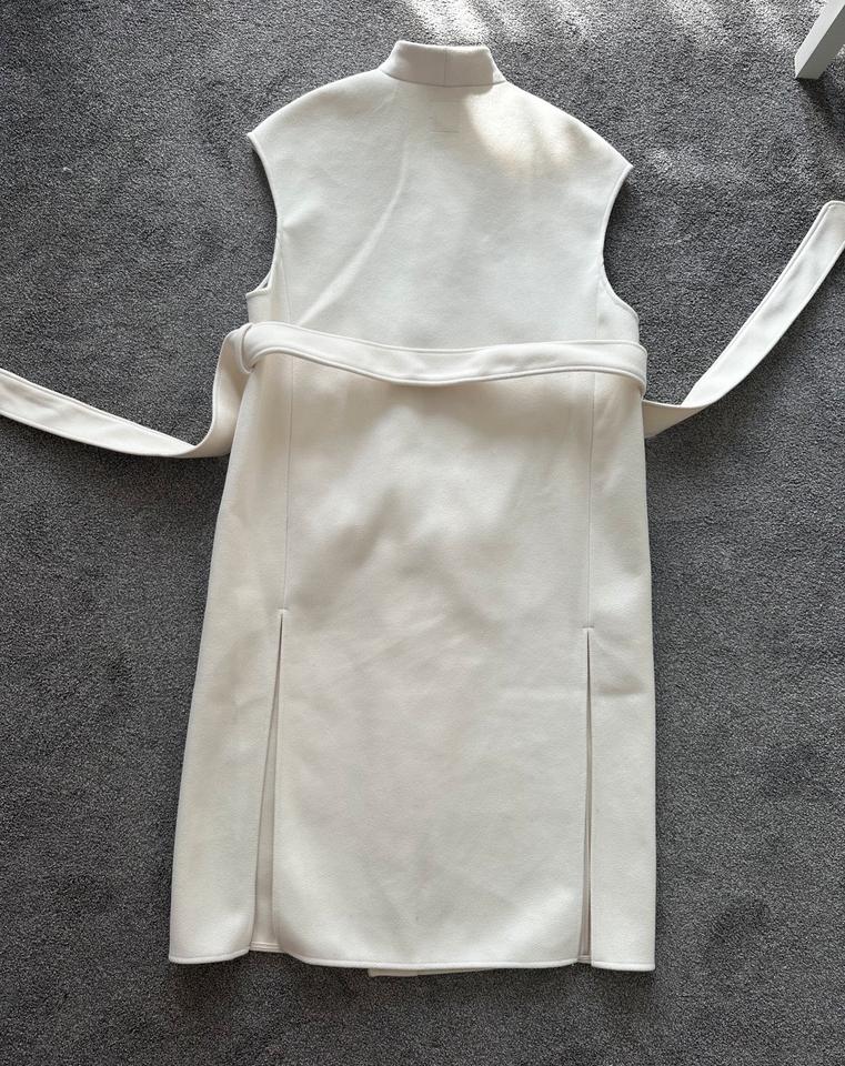 Elegante beigefarbene ärmellose Jacke, Mantel, Weste von H&M. in Meckenheim