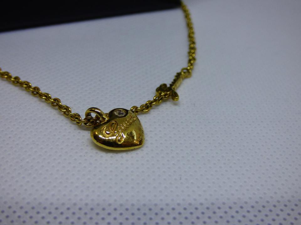 Guess Kette Herz gold mit Signature Schriftzug mit Box in Essen