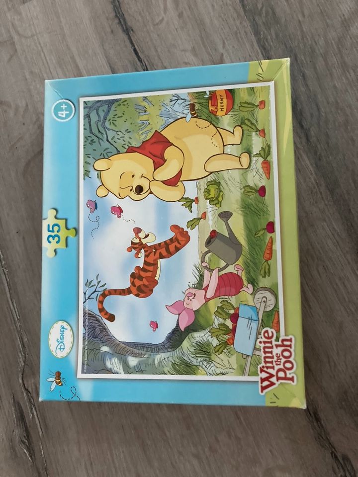 2 Puzzles Hello Kitty Winnie Puh vollständig in Eisenach