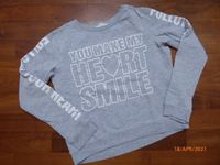 H&M - Pullover grau mit Glitzerschrift kurz in Gr. 158/164 -NEU- Baden-Württemberg - Ehrenkirchen Vorschau