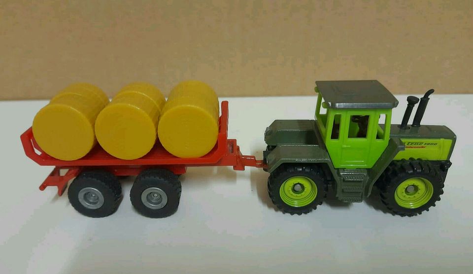 Siku 1:87 Traktor MB Trac mit Ballenwagen (1383 1670) selten in Drensteinfurt