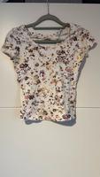 Blumiges T-Shirt mit Rückendetails Bayern - Burgthann  Vorschau