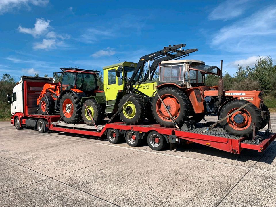 Transporte Tieflader Baumaschinen Landmaschinen   Bagger in Jossgrund