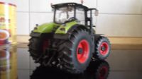 Siku Farmer 3280 Traktor Claas Axion 950 Hessen - Dietzenbach Vorschau