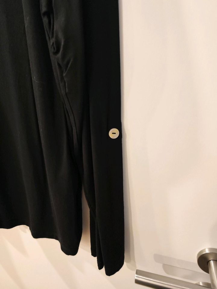 Schwarzes Shirt, mit silbernem sexy Reißverschluss in Wesselburen