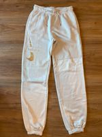 Nike Damen Jogginghose Gr. XS beige mit goldenem Logo neuwertig Baden-Württemberg - Renningen Vorschau