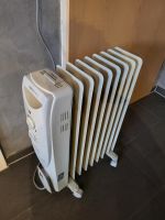 Elektro Heizung Ölradiator  9 Rippen Niedersachsen - Westoverledingen Vorschau