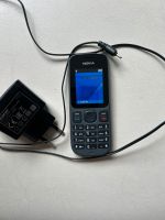 Nokia altes Handy funktioniert mit Ladekabel retro nostalgie Baden-Württemberg - Korntal-Münchingen Vorschau