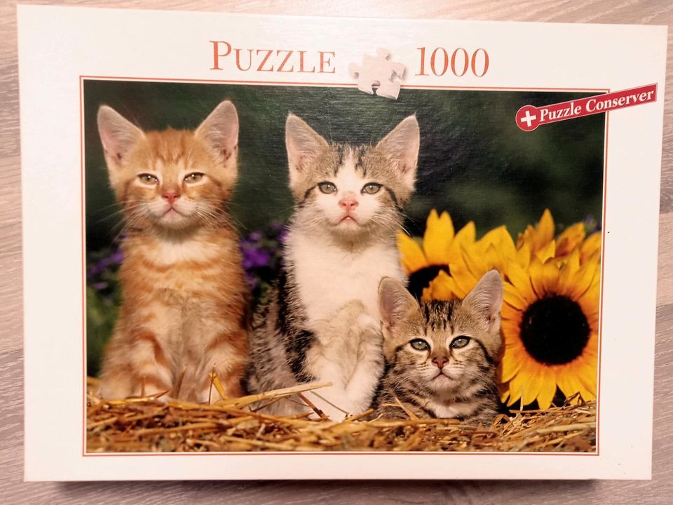 Zu verschenken: Puzzle Katzen 1.000 Teile - unvollständig in Neuss