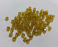 20 Tüten oliv/gelb Swarovski ® Kristalle 4mm Doppelkegel Niedersachsen - Bockenem Vorschau